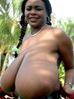 Super busty ebony bimbo wanna you watch her huge melons while she stripteasing in private.