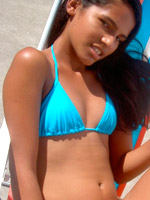 Very hot swarthy teen posing on amateur cam in bikini